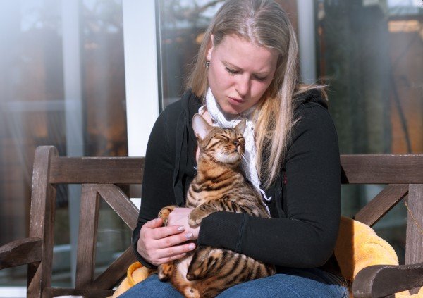 Woman with sleeping Cat